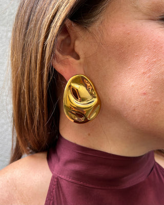 Orecchini motivo ondulato